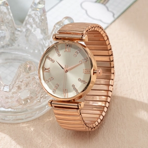 Elegant rose gold quartz watch for women with roman numerals and elastic strap