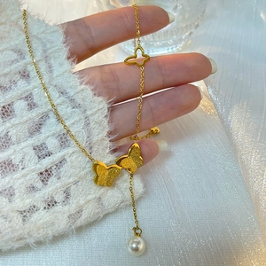 Elegant gold titanium steel butterfly necklace with pearls and matte charms