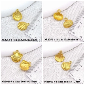 Detailed size chart for shell charms showing exact dimensions and model numbers with ruler