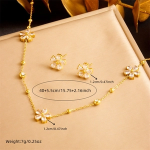 Zircon flower jewelry set with gold pendant necklace and matching stud earrings