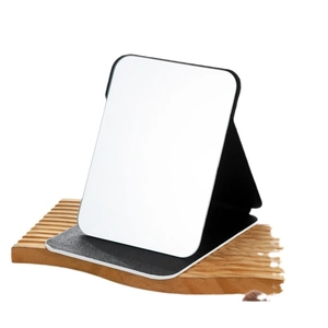 Portable rectangular folding makeup mirror with black PU leather stand on wooden base