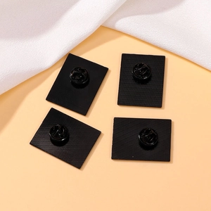 Set of four black rectangular enamel pins back view with secure butterfly clutch fasteners
