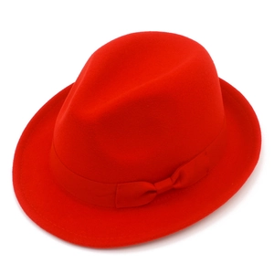 Detailed top view of a classic red wool felt fedora hat with a matching ribbon bow