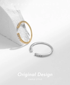 Close-up of S925 sterling silver adjustable rings with shimmering micro-pave crystals