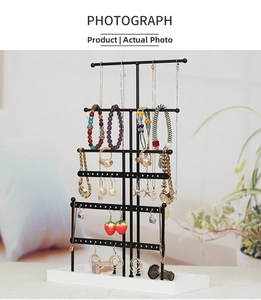 Detail view of the 6-tier metal jewelry organizer with necklaces and earrings display
