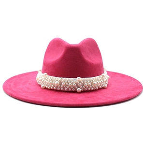 Detail of rose pink suede felt fedora featuring multi-layered pearl bead embellishments