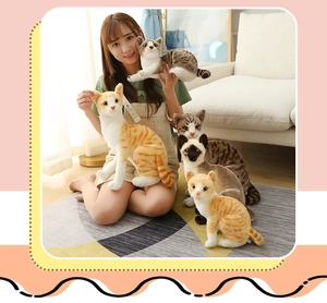 Detailed view of lifelike plush cat toys in various breeds on a warm home background