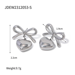 Detail view of bow heart earrings with dimensions 2.2cm x 1.9cm and weight 9.7g