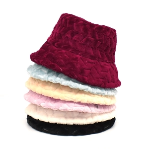 Plush textured bucket hat for women in multiple colors with quilted faux fur design