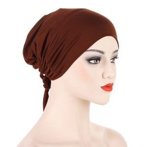 Detail view of dark brown satin lined underscarf with adjustable back ties and stitching