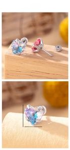 Macro detail of 8mm heart-shaped gradient zircon earrings with secure screw back design