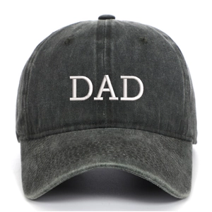 Macro detail of DAD embroidery on dark grey washed cotton vintage baseball cap