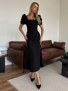 Elegant black square neck maxi dress with puff sleeves and a slim fit mermaid hem