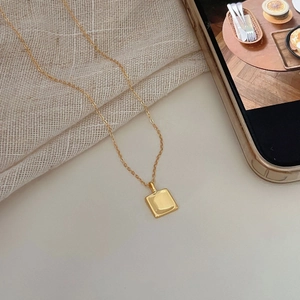 Minimalist 925 sterling silver square pendant necklace with a delicate golden chain finish