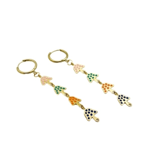 Golden titanium steel hoop earrings featuring four colorful polka dot mushroom charms
