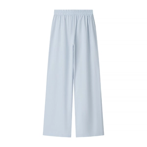 Close-up of light blue casual trousers featuring a comfortable elastic waistband design