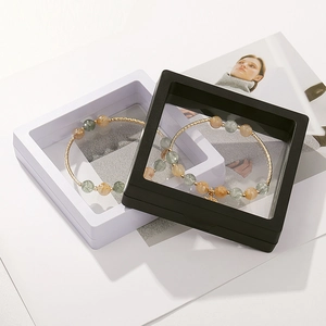 Modern PE film floating display case for jewelry showing a beaded bracelet inside