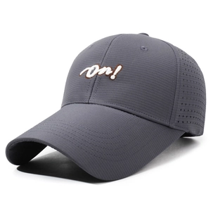 Dark grey breathable baseball cap with white on! embroidery and laser-cut vents
