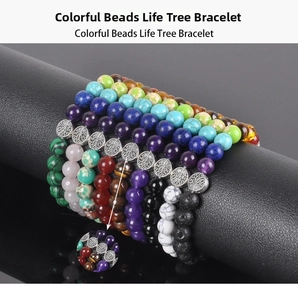 Detail view of colorful beaded bracelets with silver Tree of Life charms on display