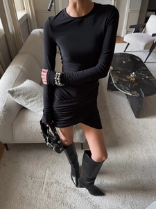 Slim fit long sleeve black mini dress with draped wrap detail for elegant summer styling
