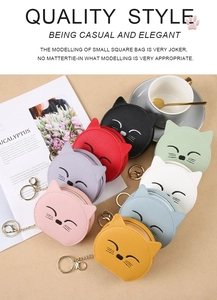 Close-up of colorful cat-shaped coin purses with lychee grain PU leather and embroidery