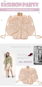 Detail of flower-shaped acrylic evening bag with marble texture and gold chain strap