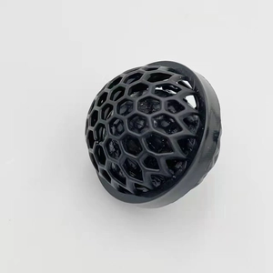 Detail of a black honeycomb sticky ball cleaner for removing dust from purses and bags