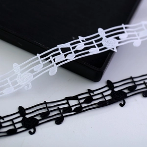 Elegant musical note embroidered lace ribbon in black and white for gift wrapping
