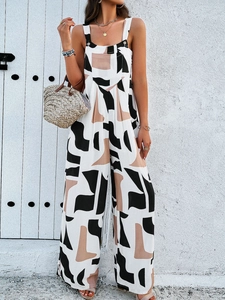 Women's sleeveless wide-leg jumpsuit featuring a modern black and beige block print design