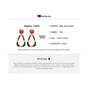 Detail of vintage teardrop resin earrings showing exact 3.9cm by 1.9cm dimensions