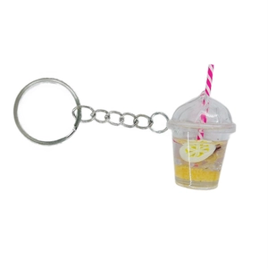 Luminous fruit tea cup keychain with lemon slice and colorful straw in miniature cup