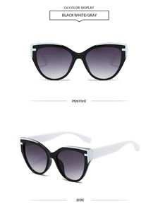 Detailed front and side views of cat-eye sunglasses with black-white frames and gray lenses