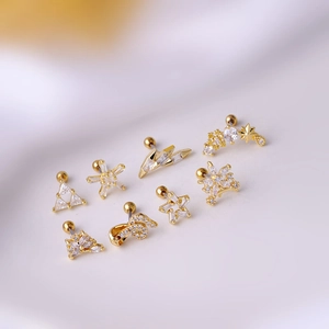 Set of eight gold titanium steel zircon stud earrings featuring stars and lightning bolts