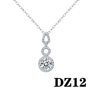 Macro detail of platinum plated silver pendant featuring brilliant cut zircons and fine chain