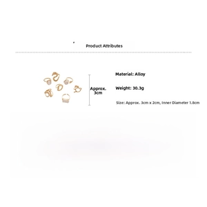 Detail view of 7-piece gold alloy ring set with sizes, weights and pearl accents