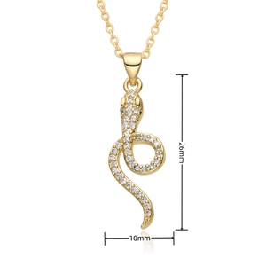 Detailed view of micro-paved gold snake pendant necklace with 26mm by 10mm dimensions