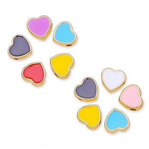 Macro shot of 8mm heart-shaped alloy beads with colorful enamel and gold plating