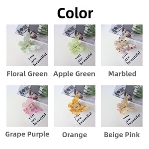 Detailed grid showing six colorful acetate butterfly hair claws in various vibrant floral patterns