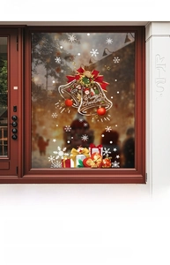 Detailed Christmas bell and Santa window decals applied on a shop glass door