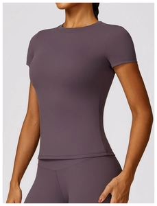 Detail of slim fit quick-dry yoga t-shirt for women in dusty purple with round neck
