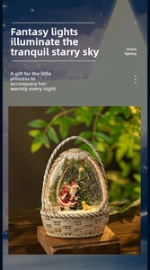 Close-up of Santa Claus snow globe with LED lighting in a woven basket design