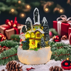 Detail of lit Christmas resin house with Santa Claus and snow texture for festive decor