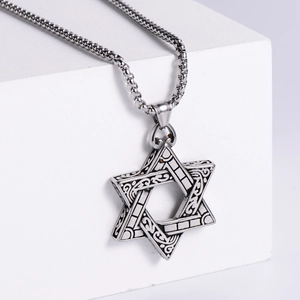 Vintage stainless steel Star of David pendant necklace with intricate Celtic carvings