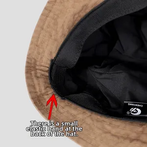 Detail view of adjustable elastic band and sweatband inside the cotton bucket hat