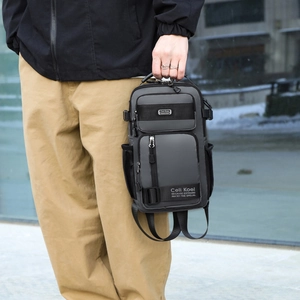 Men's gray multi-functional crossbody chest bag in durable nylon with adjustable strap