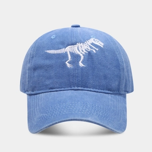 Washed blue baseball cap featuring a white dinosaur skeleton embroidery on the front
