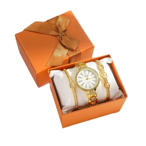Women's gold quartz watch with diamond-set chain and two matching bracelets in orange gift box