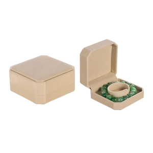 Octagonal beige velvet jewelry box shown in open and closed views for bracelets