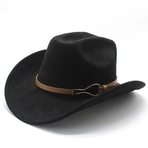 Detail of black felt cowboy hat featuring brown leather band and gold horseshoe buckle