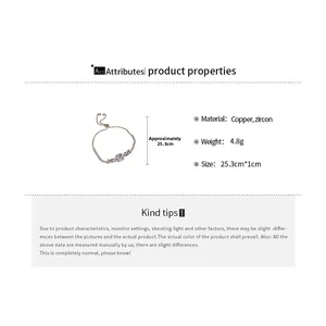 Adjustable gold chain bracelet with geometric cubic zirconia measuring 25.3cm in length